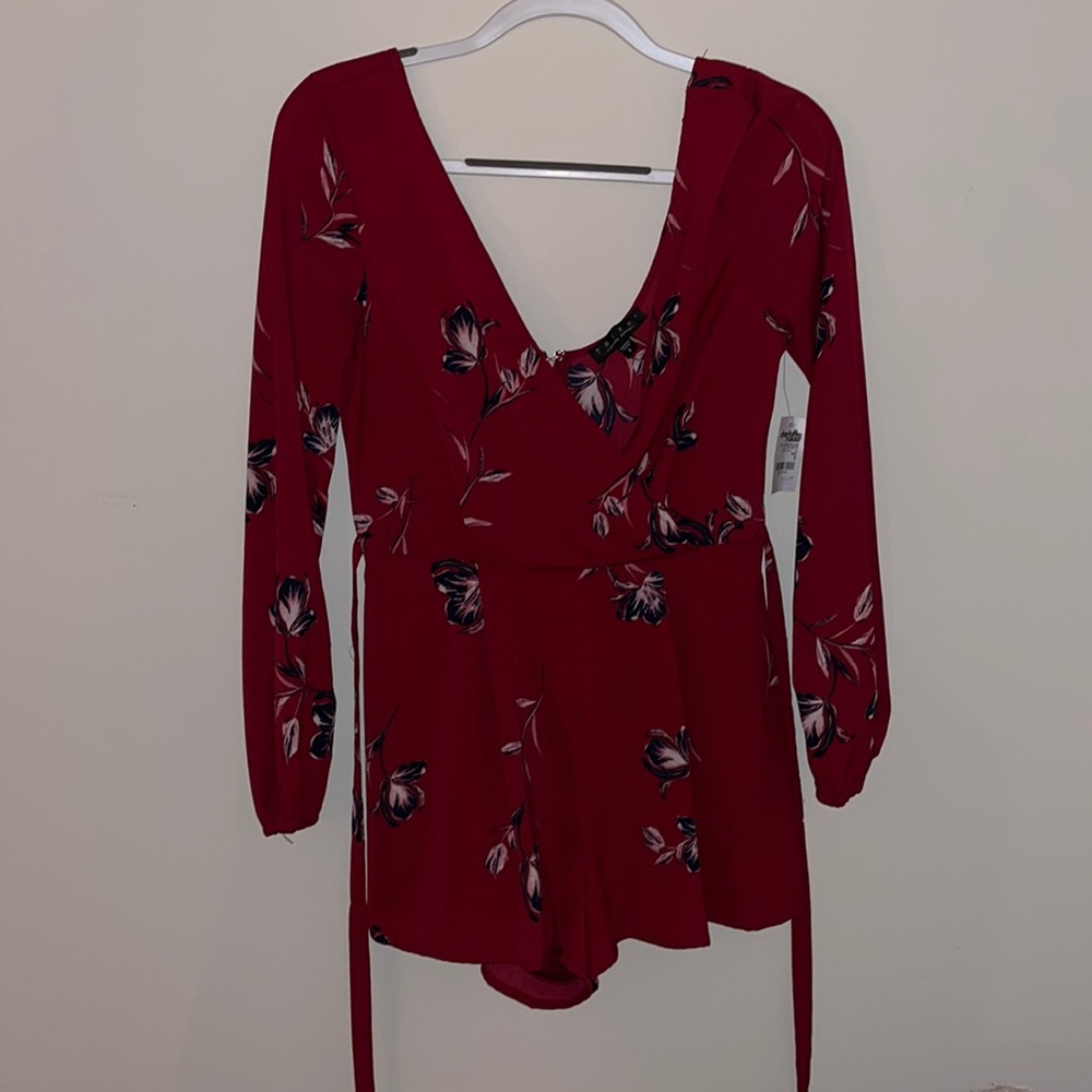 Red romper with floral design